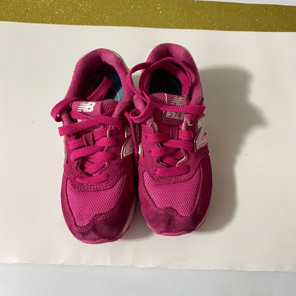 Pink and white kids New Balance size 12